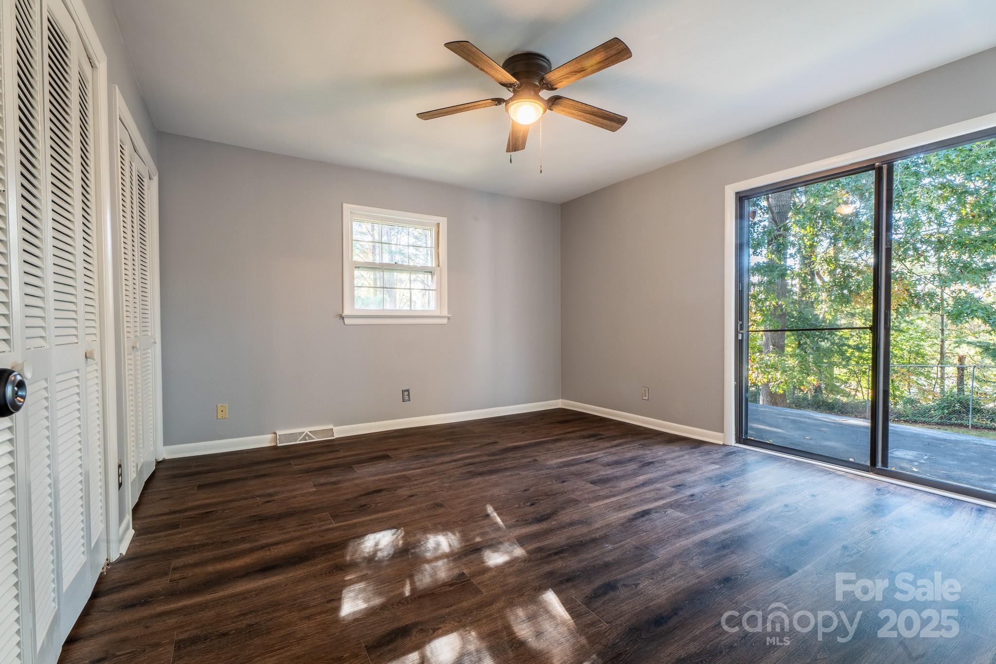 3851 Idlewood Acres Road Hickory, NC 28601 - Photo 24 of 34 wooden floor in an empty room with a window
