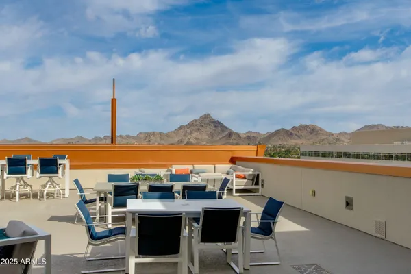 a view of a terrace with furniture