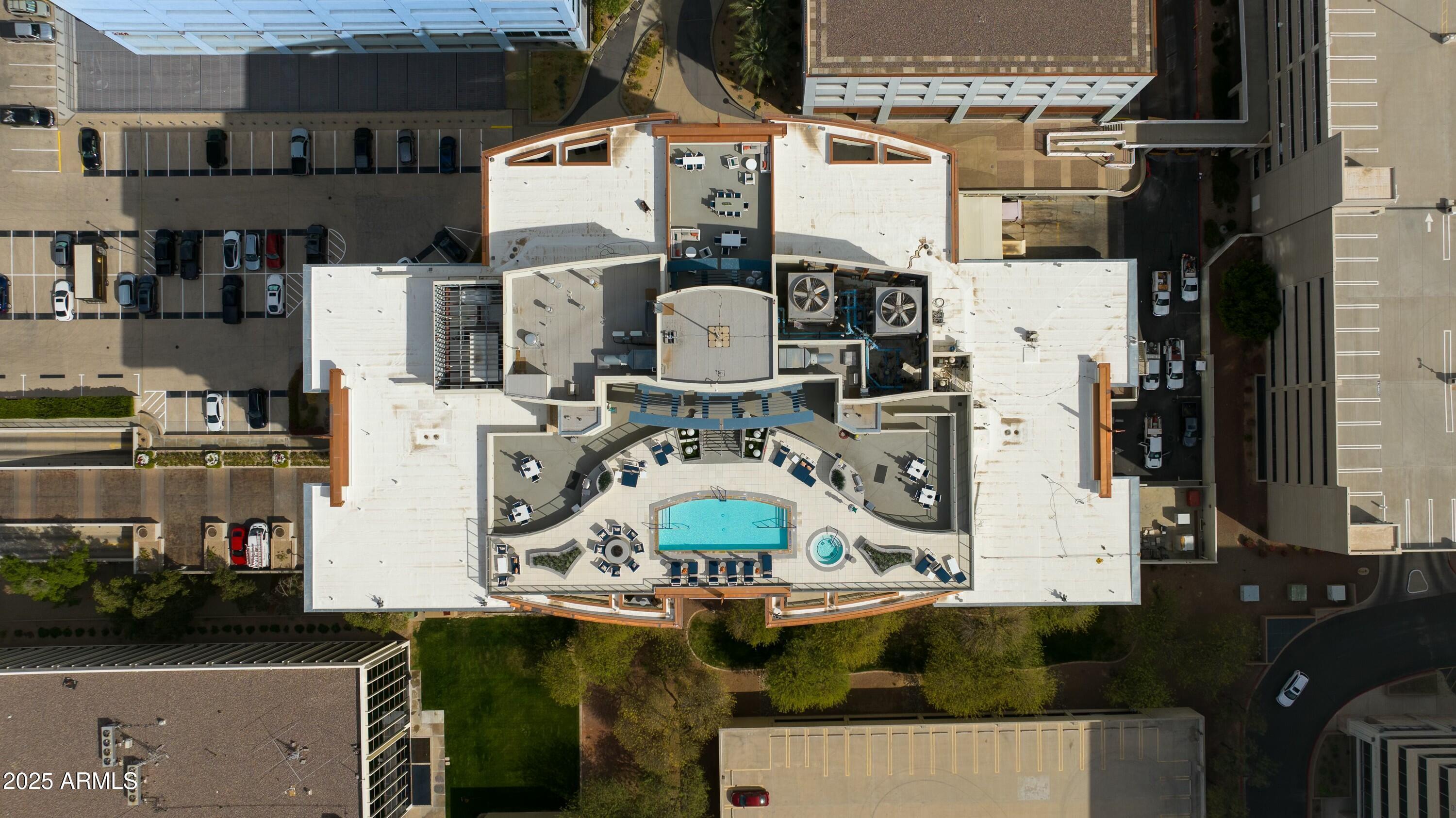 2211 East Camelback Road, Unit 402 Phoenix, AZ 85016 - Photo 25 of 27 an aerial view of residential houses with outdoor space