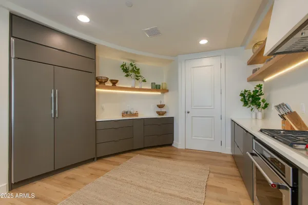 a room with window and cabinet