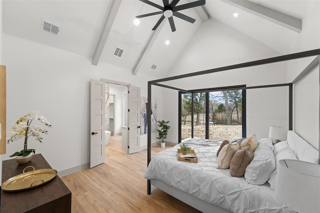 14120 Park Way Log Cabin, TX 75148 - Photo 12 of 40 a bed room with a bed and a window