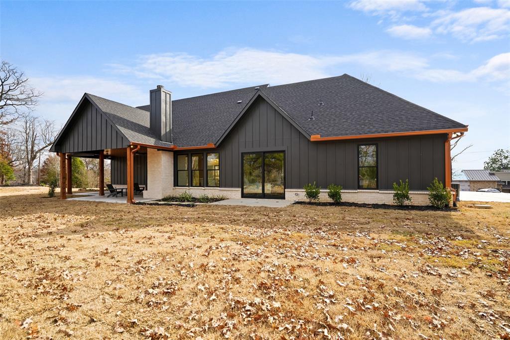 14120 Park Way Log Cabin, TX 75148 - Photo 34 of 40 a front view of a house with a yard