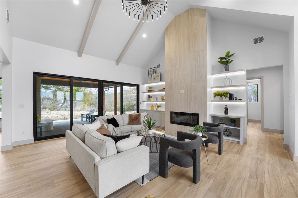 14120 Park Way Log Cabin, TX 75148 - Photo 6 of 40 a living room with furniture and a fireplace