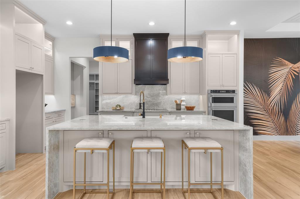 14120 Park Way Log Cabin, TX 75148 - Photo 7 of 40 a kitchen with stainless steel appliances granite countertop a sink a stove a refrigerator and island