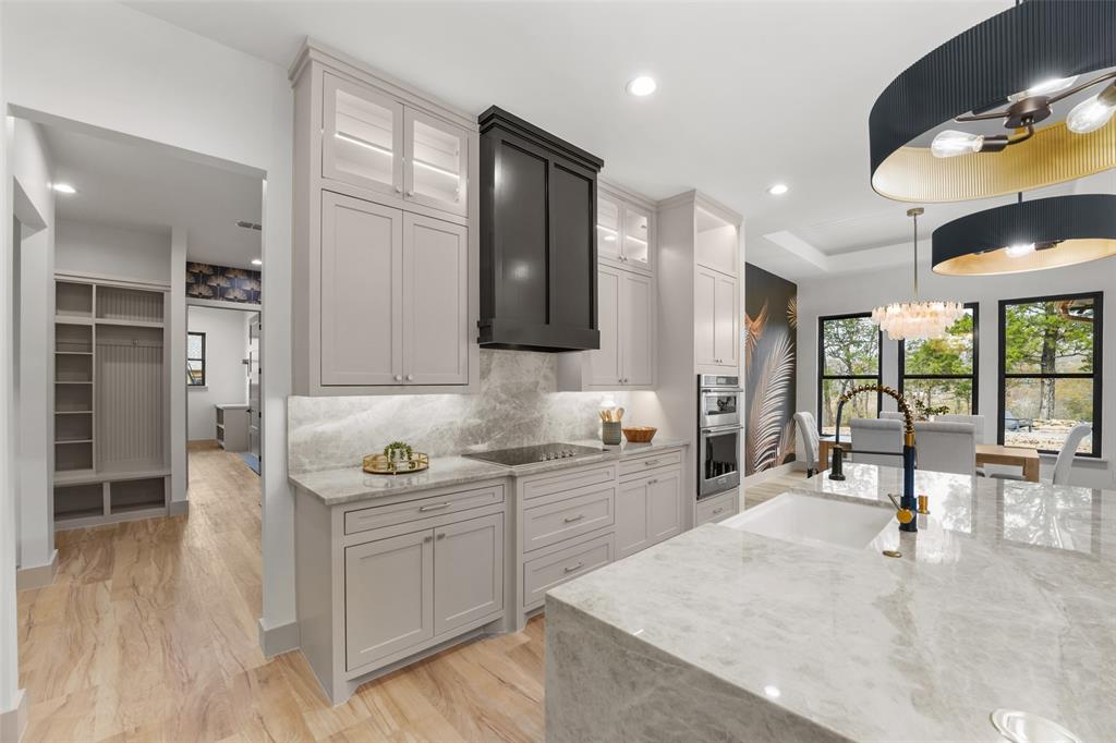14120 Park Way Log Cabin, TX 75148 - Photo 8 of 40 a kitchen with sink cabinets and window