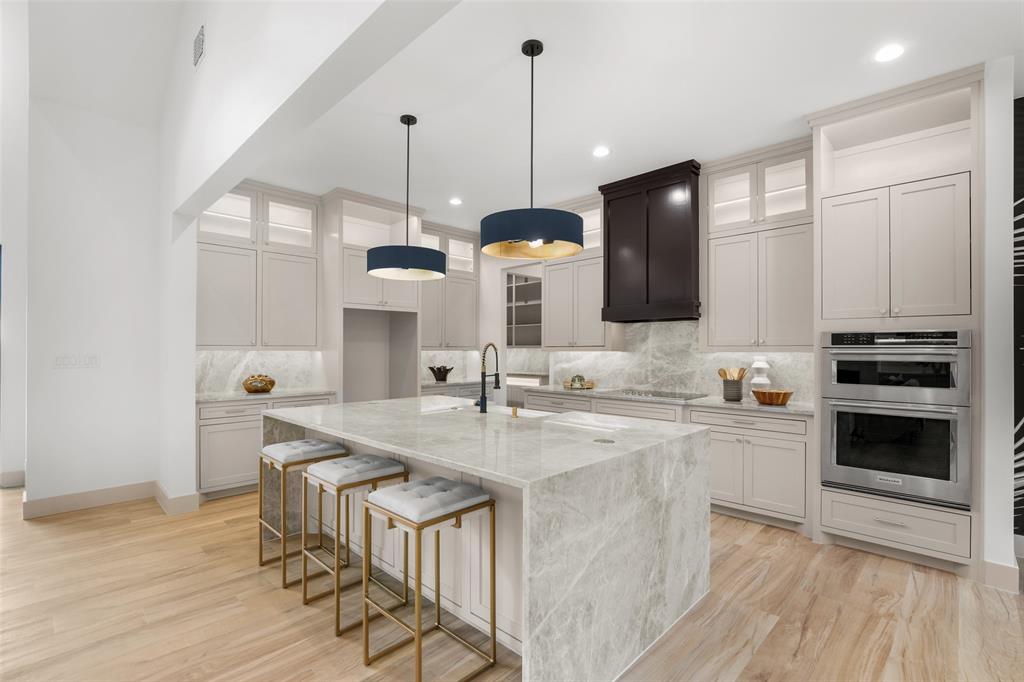 14120 Park Way Log Cabin, TX 75148 - Photo 10 of 40 a kitchen with a sink cabinets and wooden floor