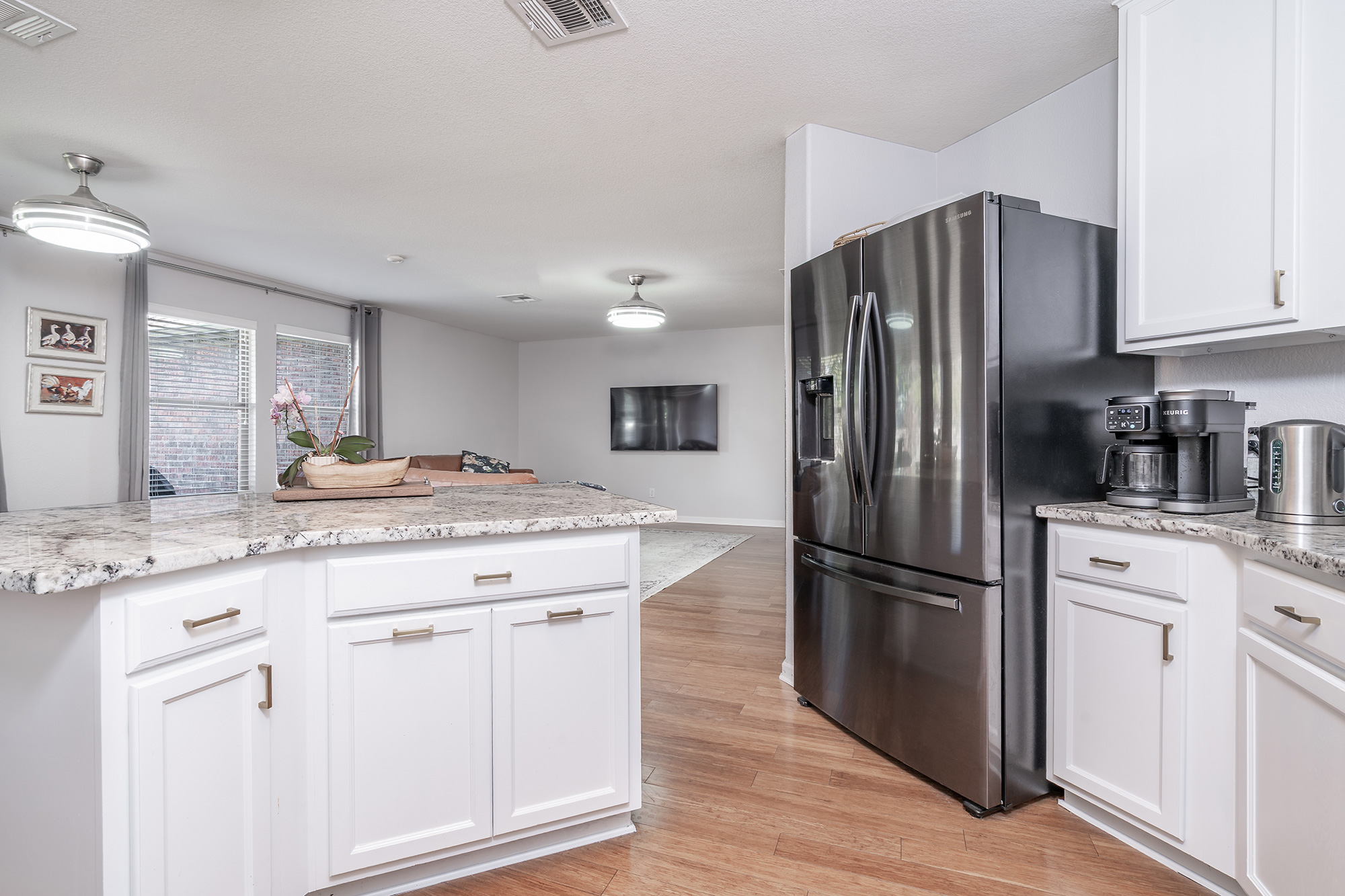 328 Cedar Lake Boulevard Georgetown, TX 78633 - Photo 13 of 34 a kitchen with granite countertop a refrigerator stove and sink