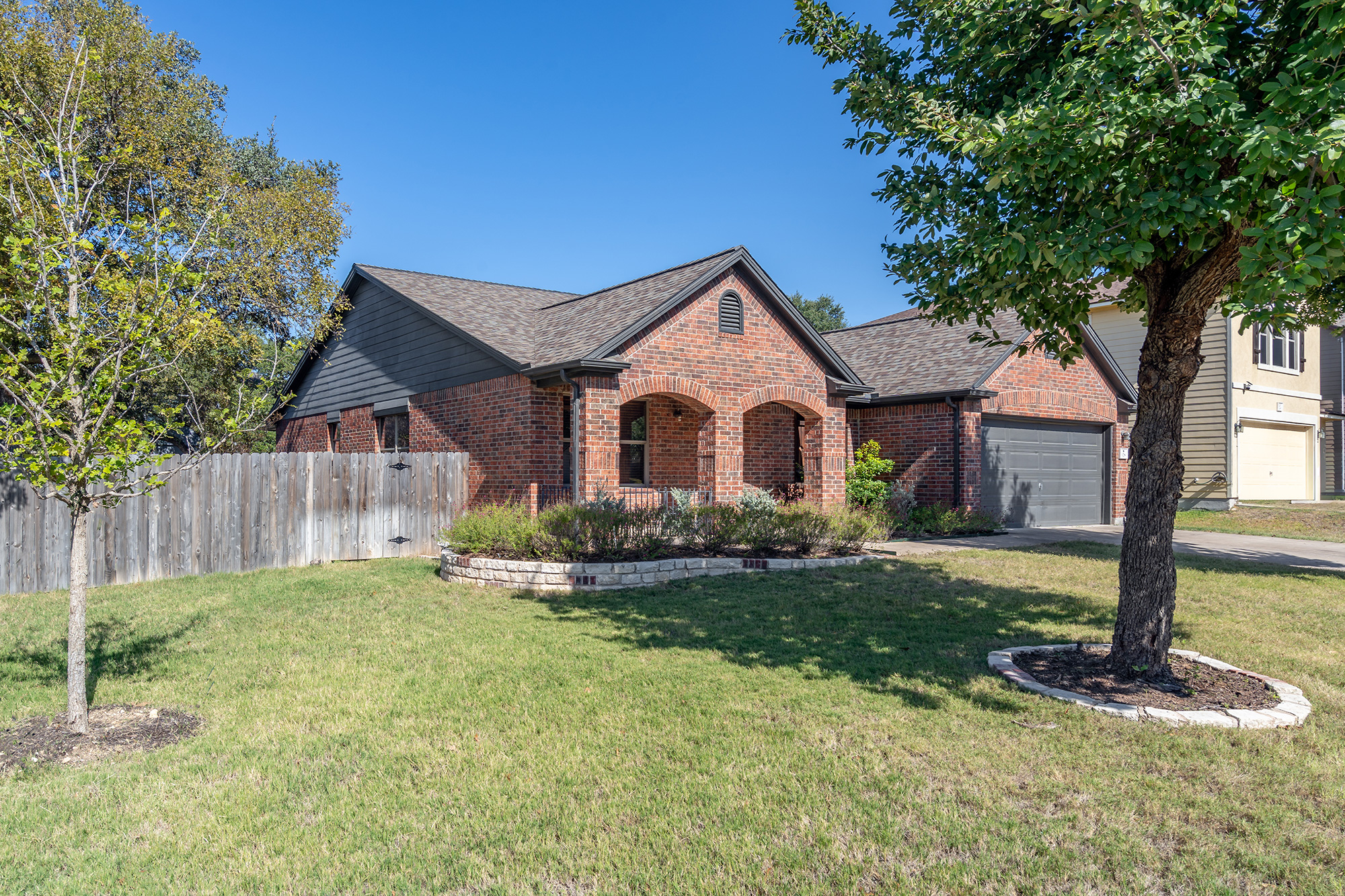 328 Cedar Lake Boulevard Georgetown, TX 78633 - Photo 2 of 34 a front view of a house with a yard