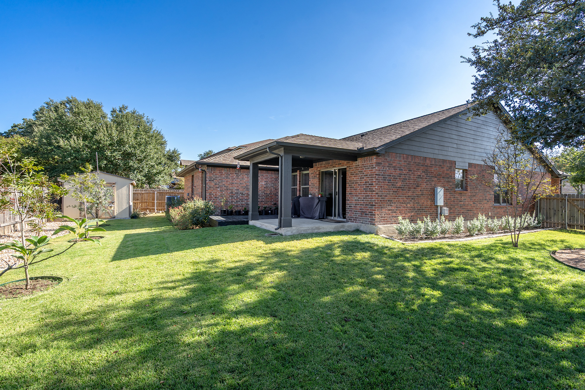 328 Cedar Lake Boulevard Georgetown, TX 78633 - Photo 26 of 34 a front view of a house with a yard