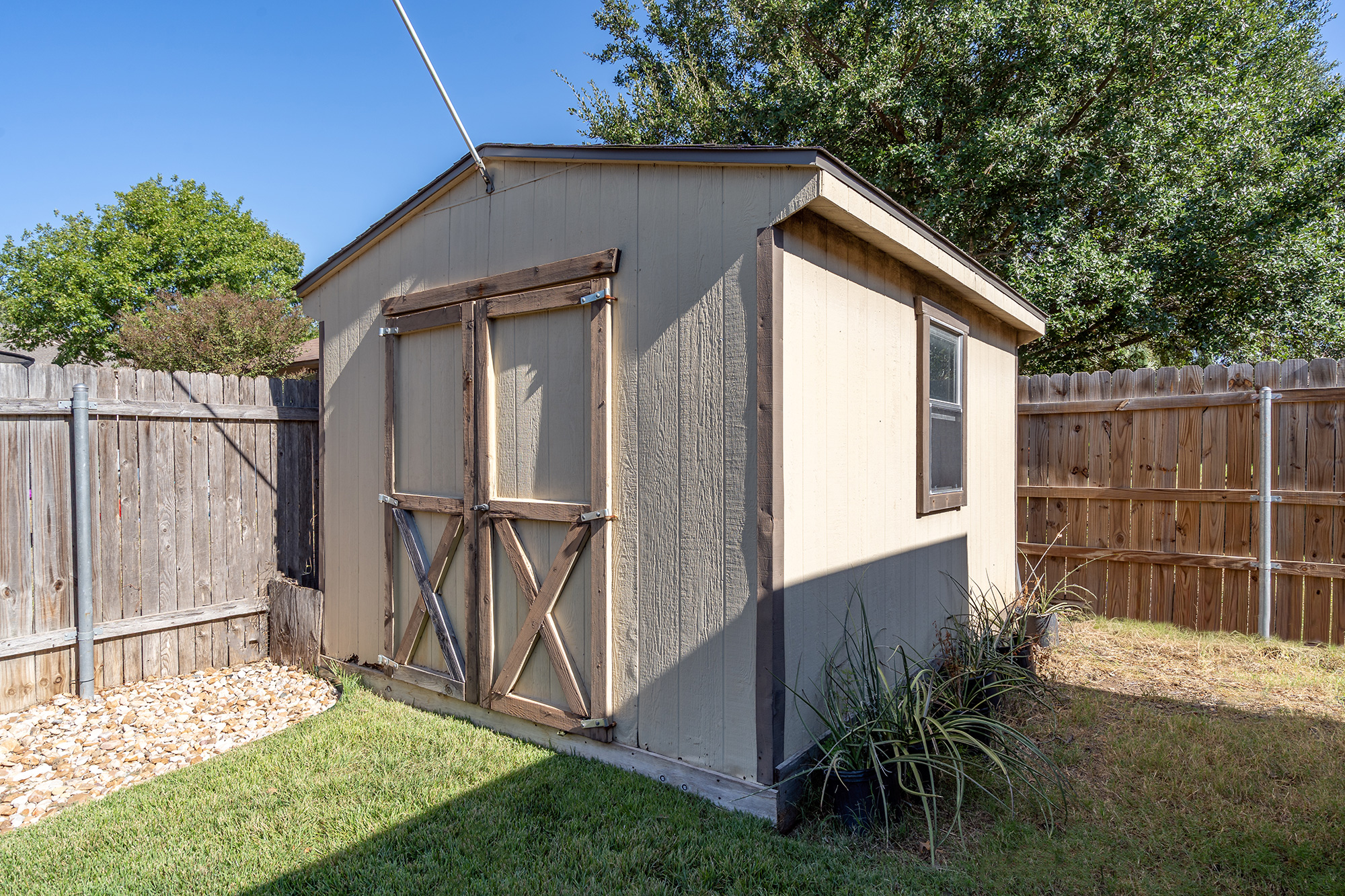 328 Cedar Lake Boulevard Georgetown, TX 78633 - Photo 31 of 34 a backyard of a house with lots of green space