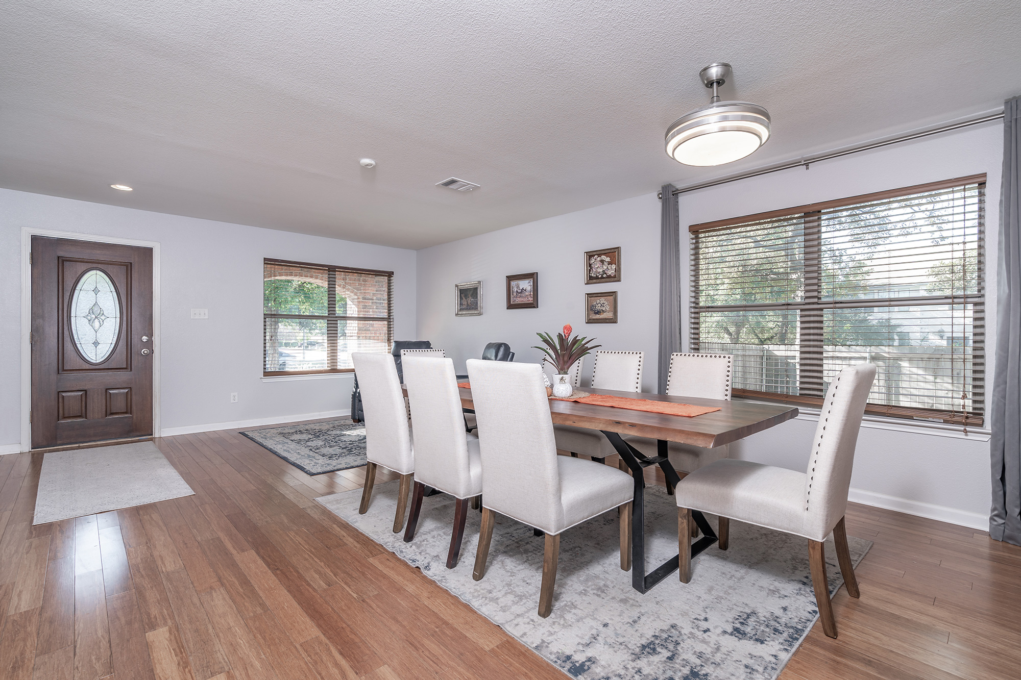 328 Cedar Lake Boulevard Georgetown, TX 78633 - Photo 32 of 34 a view of a dining room with furniture window and wooden floor