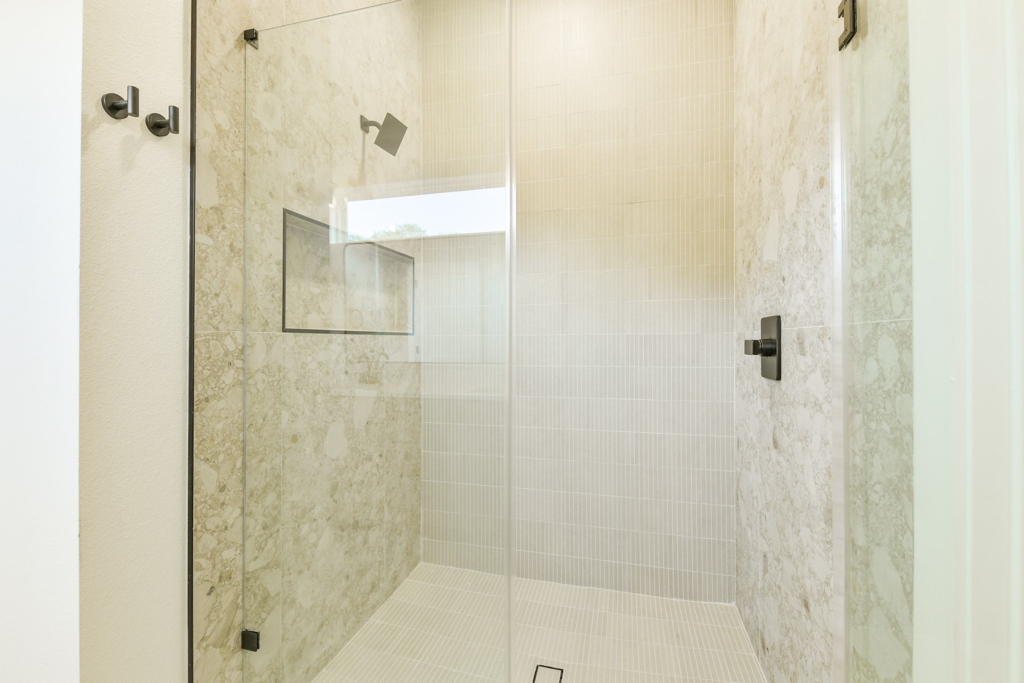 164 Wallace Street Houston, TX 77022 - Photo 12 of 29 a bathroom with a shower