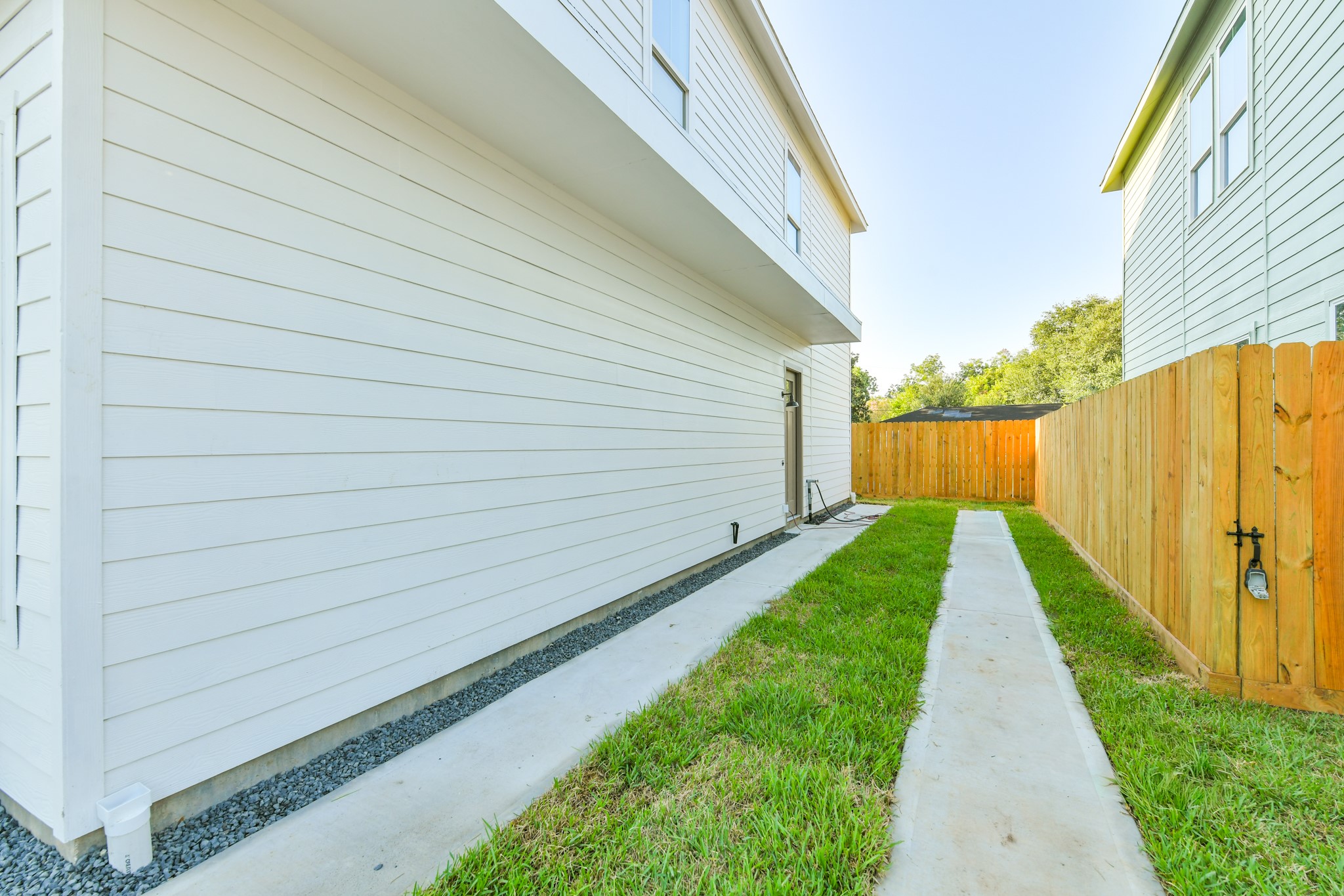 164 Wallace Street Houston, TX 77022 - Photo 24 of 29 a view of a backyard with pathway