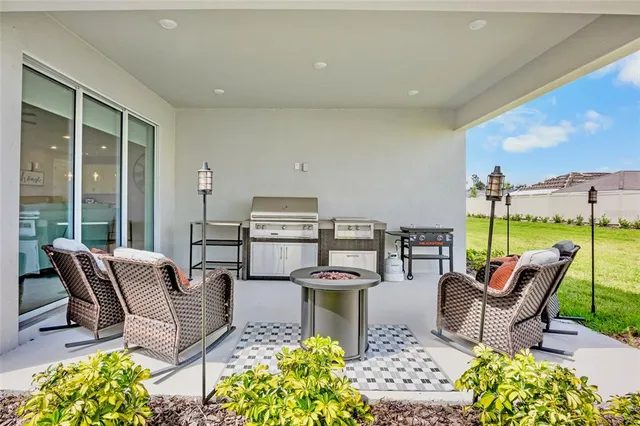 a outdoor living space with furniture and garden view