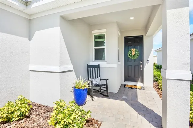 a view of a living room and a window