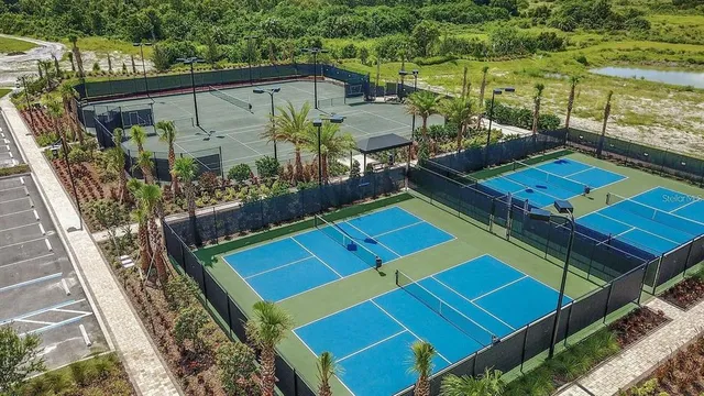 a view of a backyard with sitting area