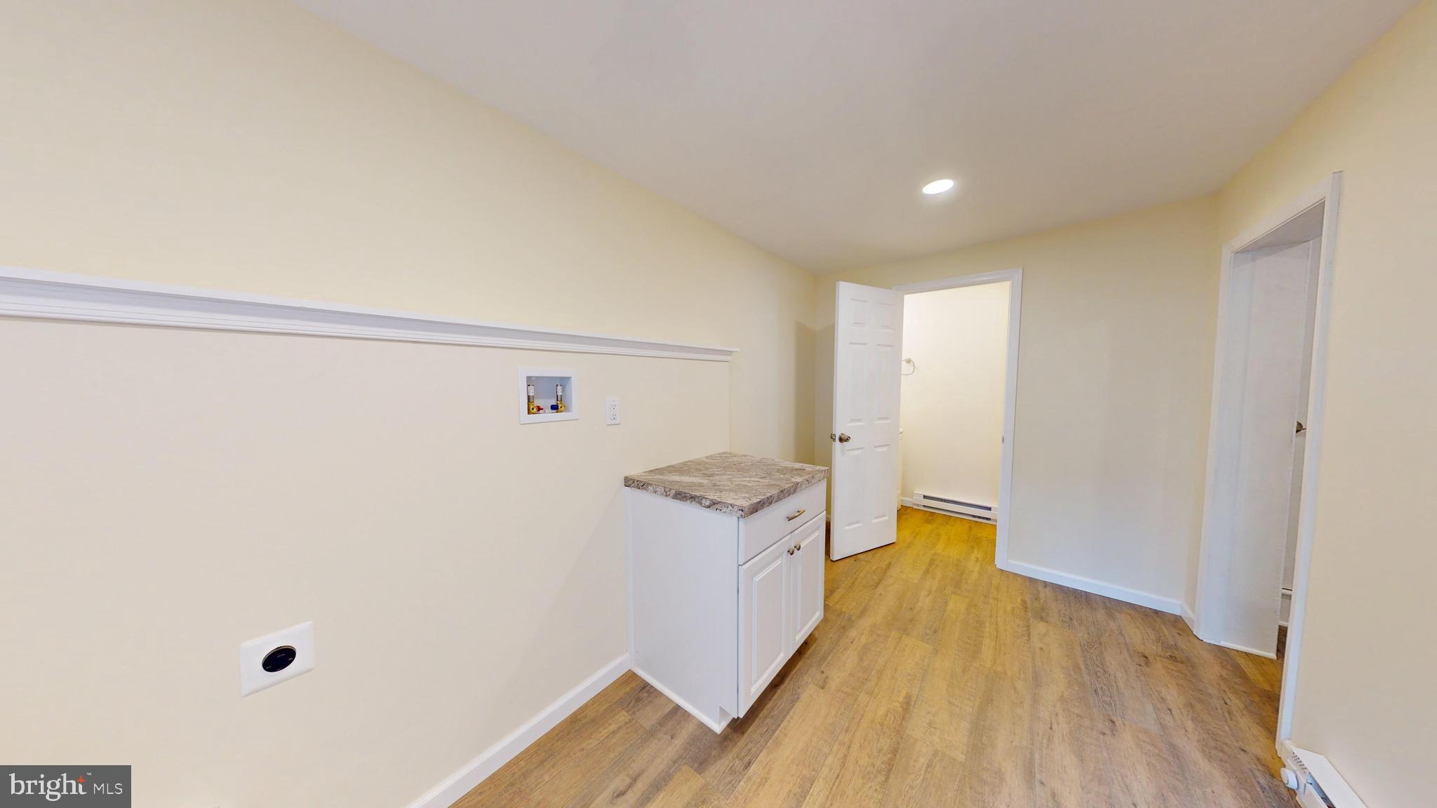824 Kintner Road Kintnersville, PA 18930 - Photo 12 of 33 a view of a hallway with wooden floor