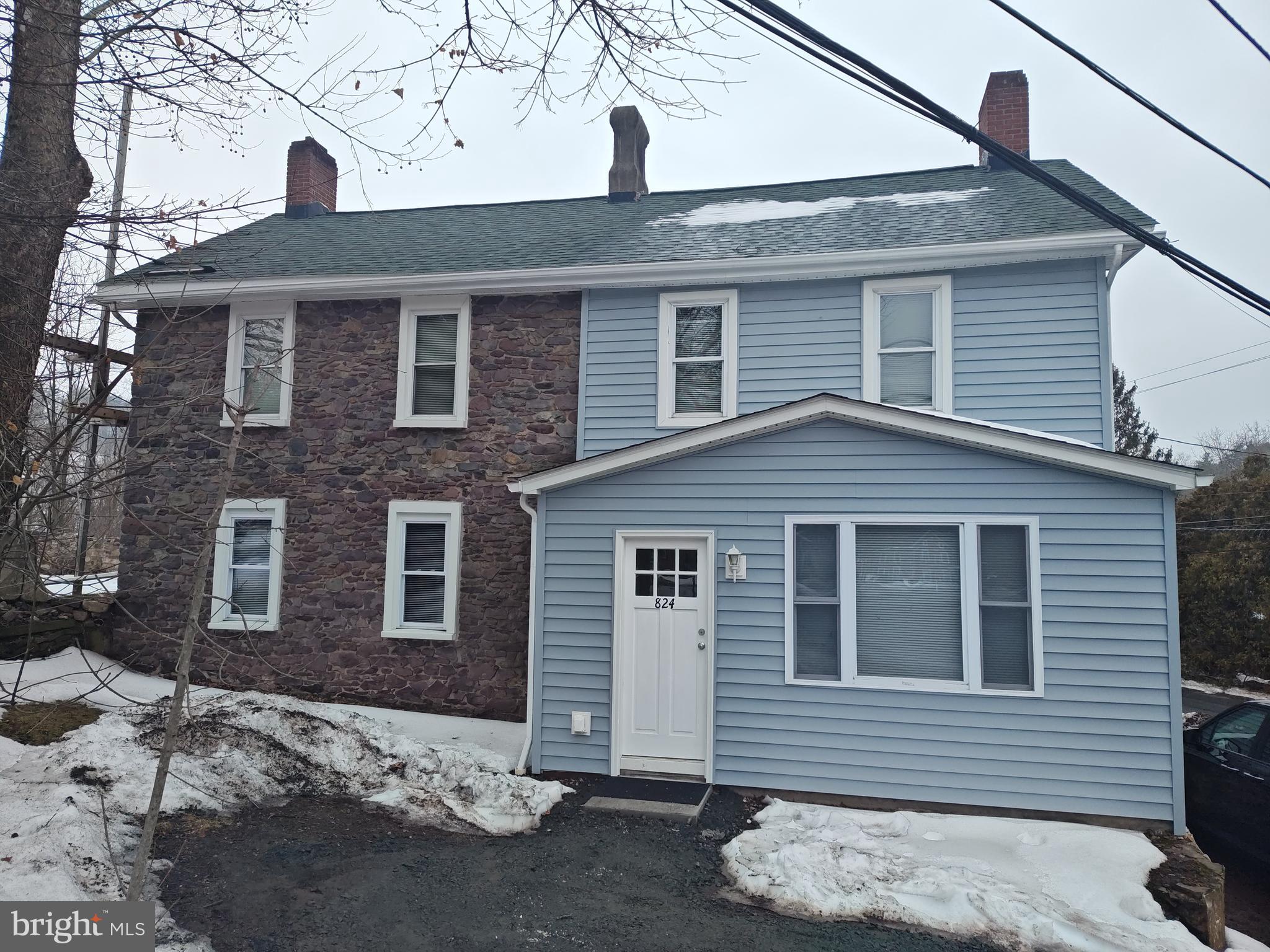 824 Kintner Road Kintnersville, PA 18930 - Photo 33 of 33 a front view of a house with a tree