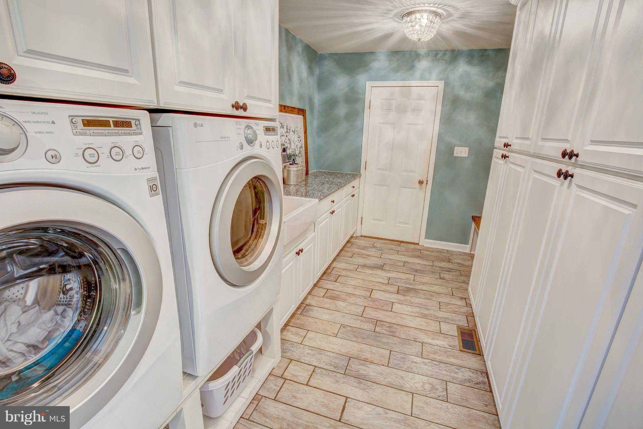3172 Soper Road Huntingtown, MD 20639 - Photo 14 of 30 Custom Designed Laundry Room w/ Built-Ins