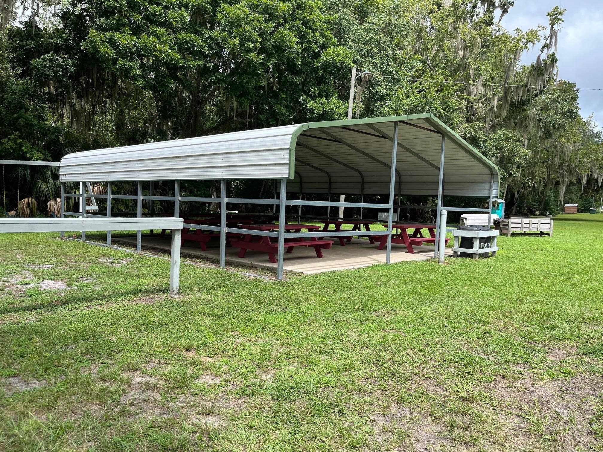 118 July Georgetown, FL 32139 - Photo 8 of 13 a view of a house with a yard and sitting area