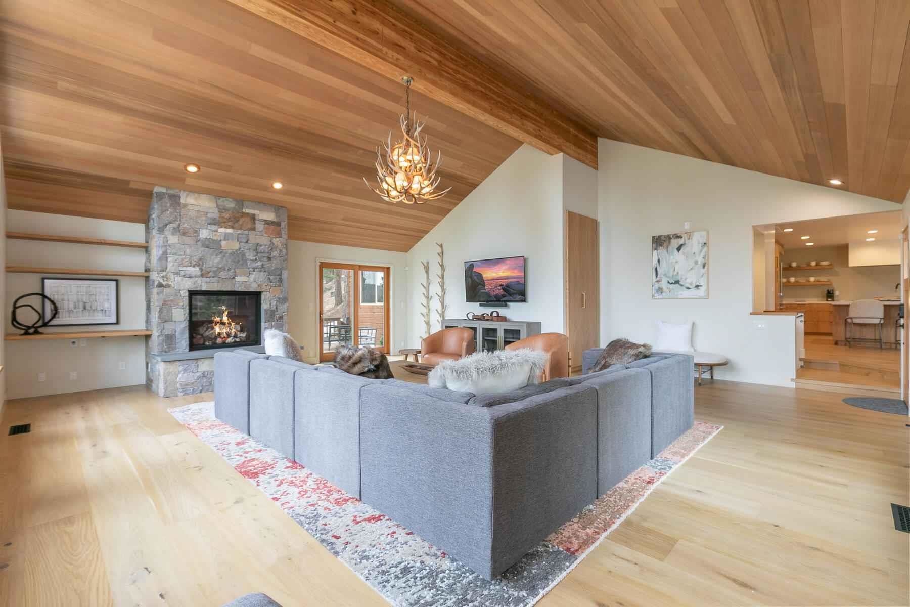 237 Basque Drive Truckee, CA 96161 - Photo 9 of 21 a living room with furniture and a fireplace