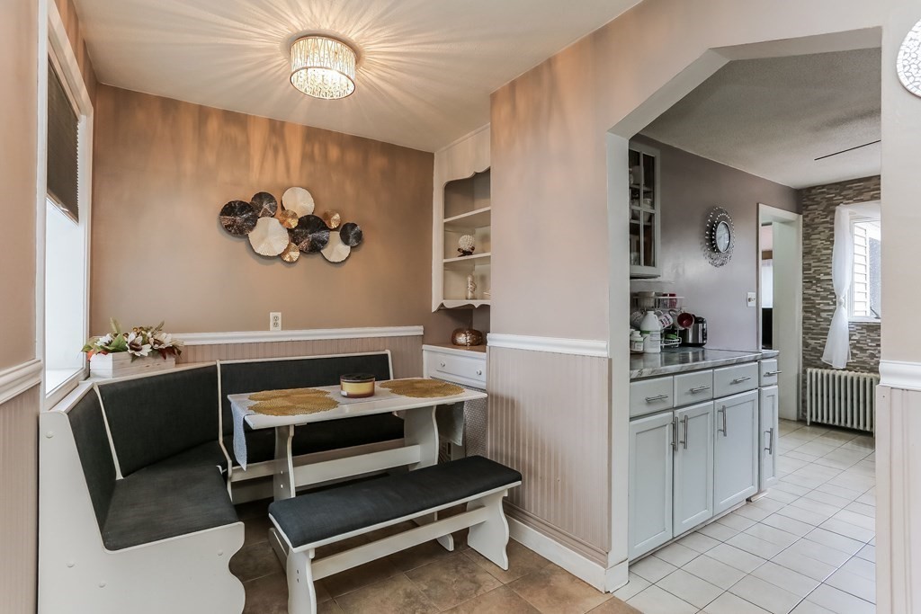 829 River Road Agawam, MA 01001 - Photo 14 of 29 a view of kitchen with cabinets and window