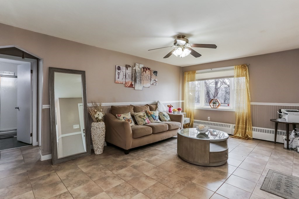 829 River Road Agawam, MA 01001 - Photo 16 of 29 a living room with furniture and window
