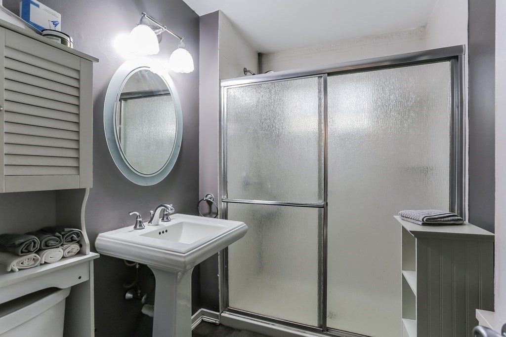 829 River Road Agawam, MA 01001 - Photo 19 of 29 a bathroom with a sink and a mirror