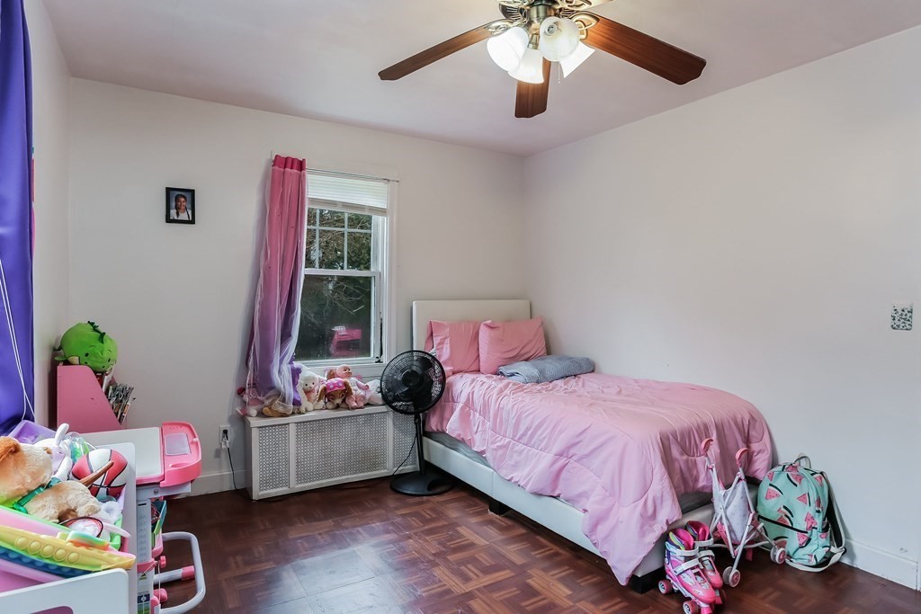 829 River Road Agawam, MA 01001 - Photo 22 of 29 a bedroom with a bed and a window