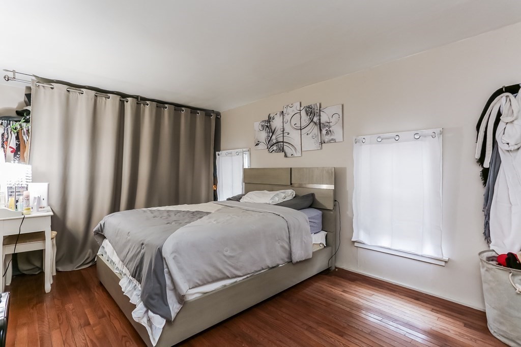 829 River Road Agawam, MA 01001 - Photo 8 of 29 a bedroom with a bed and a window