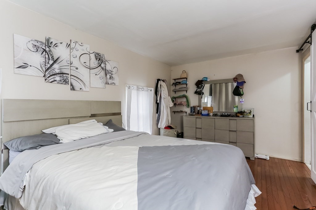 829 River Road Agawam, MA 01001 - Photo 10 of 29 a bedroom with a bed and a television