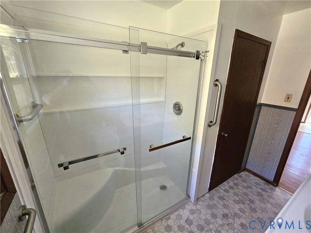 37 Bear Branch Road Farmville, VA 23901 - Photo 13 of 48 a bathroom with a glass door shower