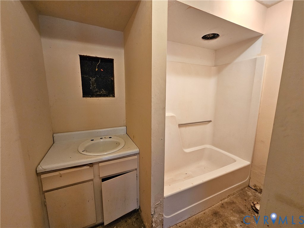 37 Bear Branch Road Farmville, VA 23901 - Photo 20 of 48 a bathroom with a sink a toilet and vanity