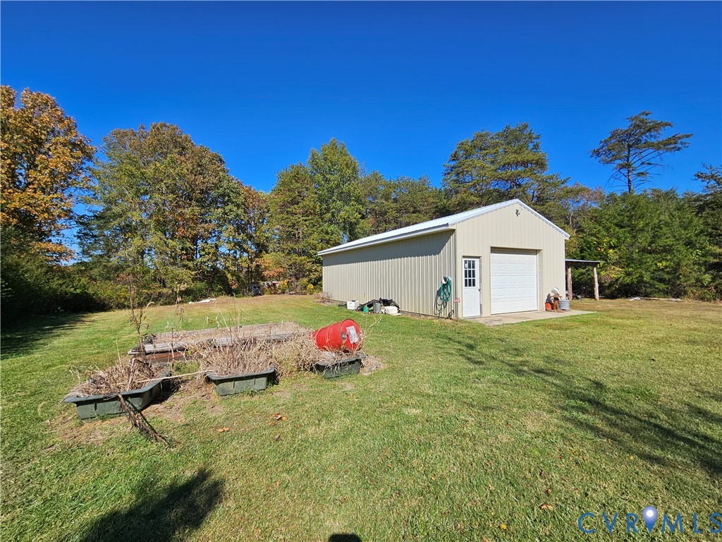 37 Bear Branch Road Farmville, VA 23901 - Photo 27 of 48 a view of backyard with deck and garden
