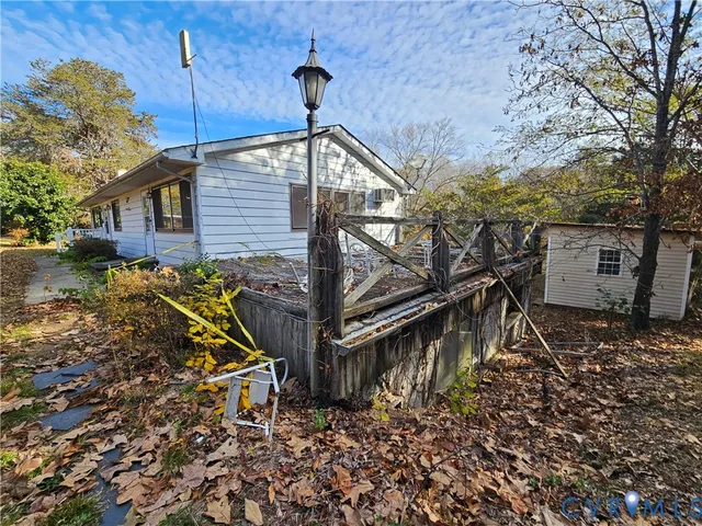 a view of swimming pool with a outdoor seating