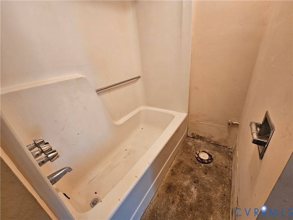 37 Bear Branch Road Farmville, VA 23901 - Photo 47 of 48 a bathroom with a tub and shower