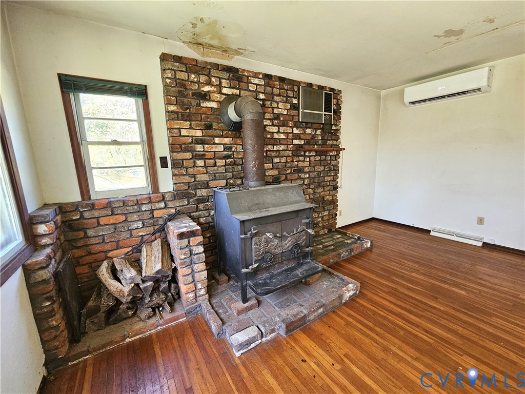 37 Bear Branch Road Farmville, VA 23901 - Photo 7 of 48 a view of a room with wooden floor and shoes