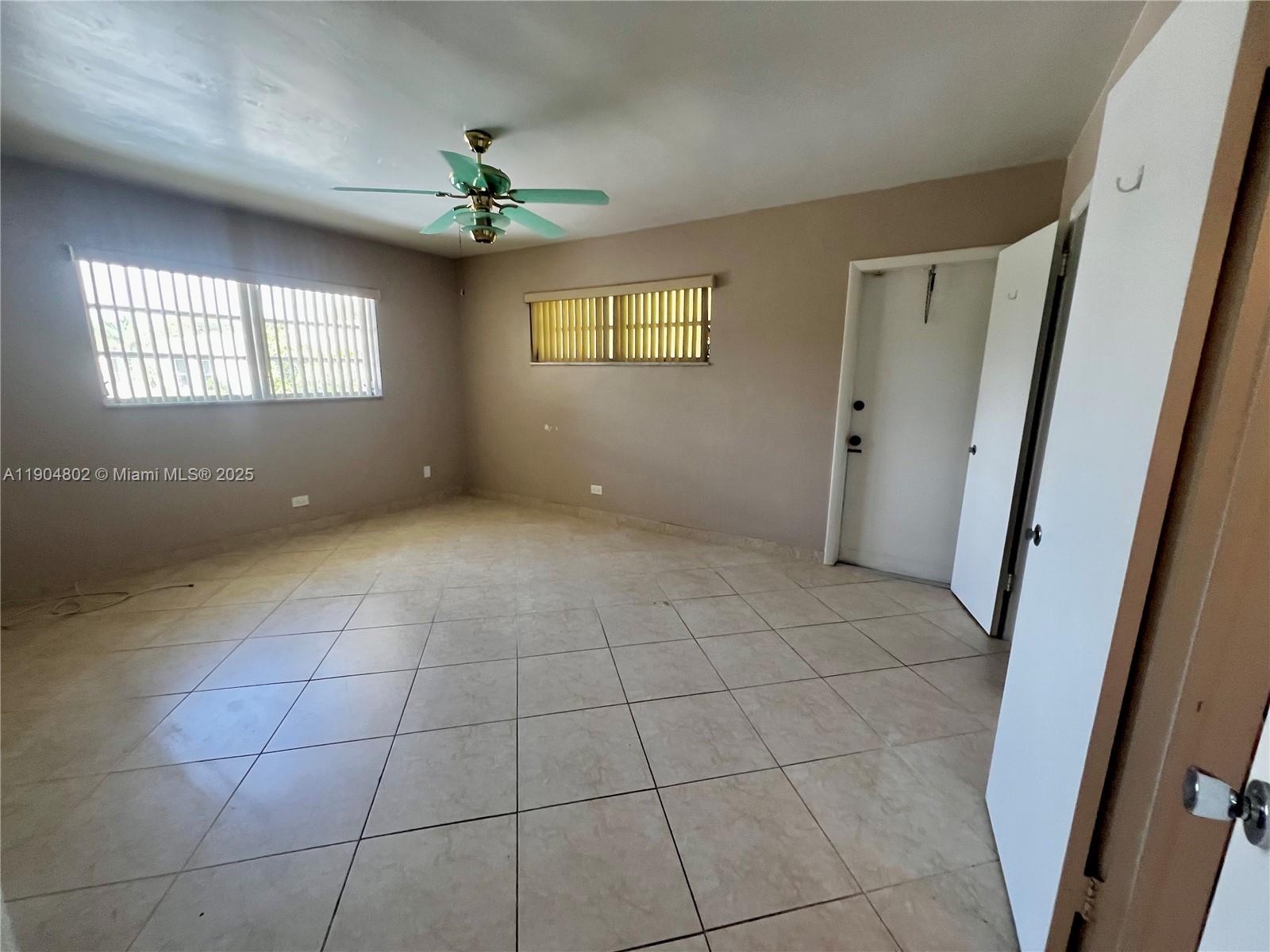 1501 Arthur Street, Unit 9 Hollywood, FL 33020 - Photo 12 of 20 a view of an empty room with a window