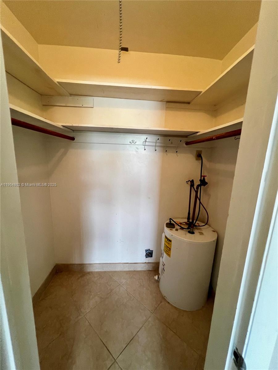 1501 Arthur Street, Unit 9 Hollywood, FL 33020 - Photo 13 of 20 a bathroom with a sink and mirror