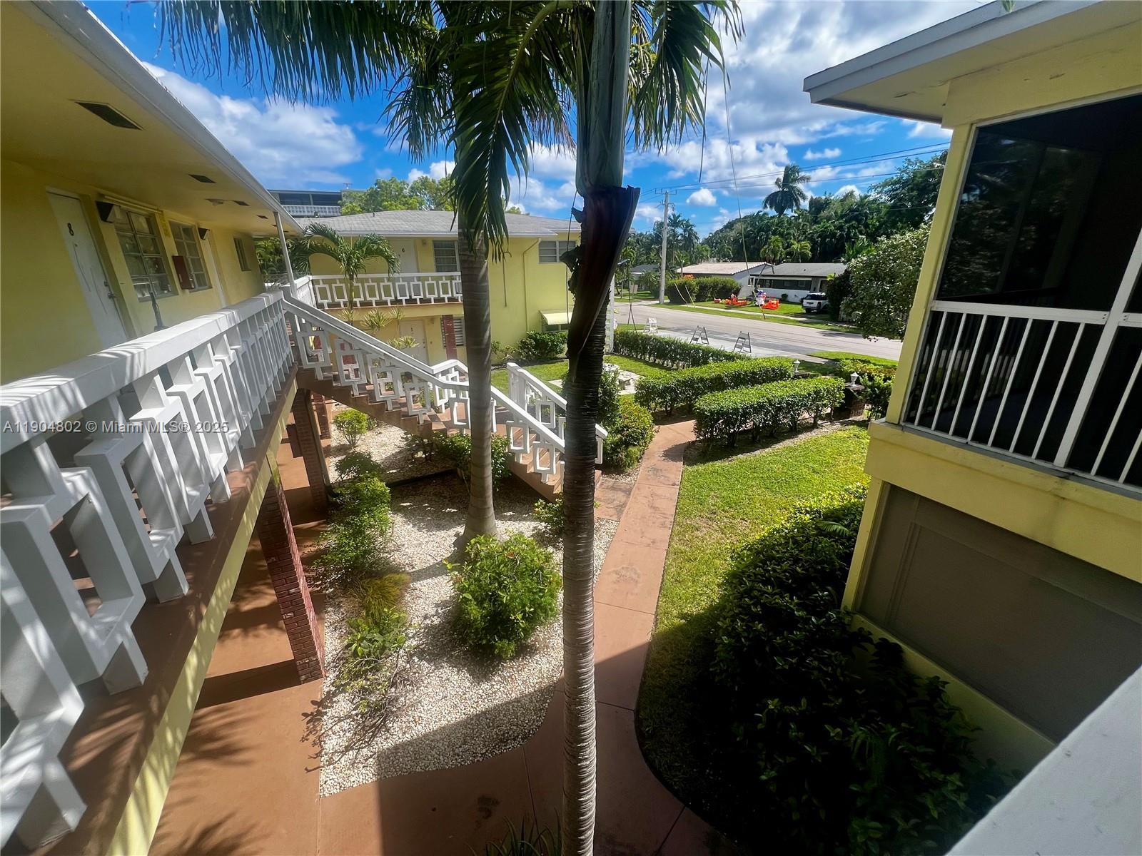 1501 Arthur Street, Unit 9 Hollywood, FL 33020 - Photo 17 of 20 a view of a backyard with plants