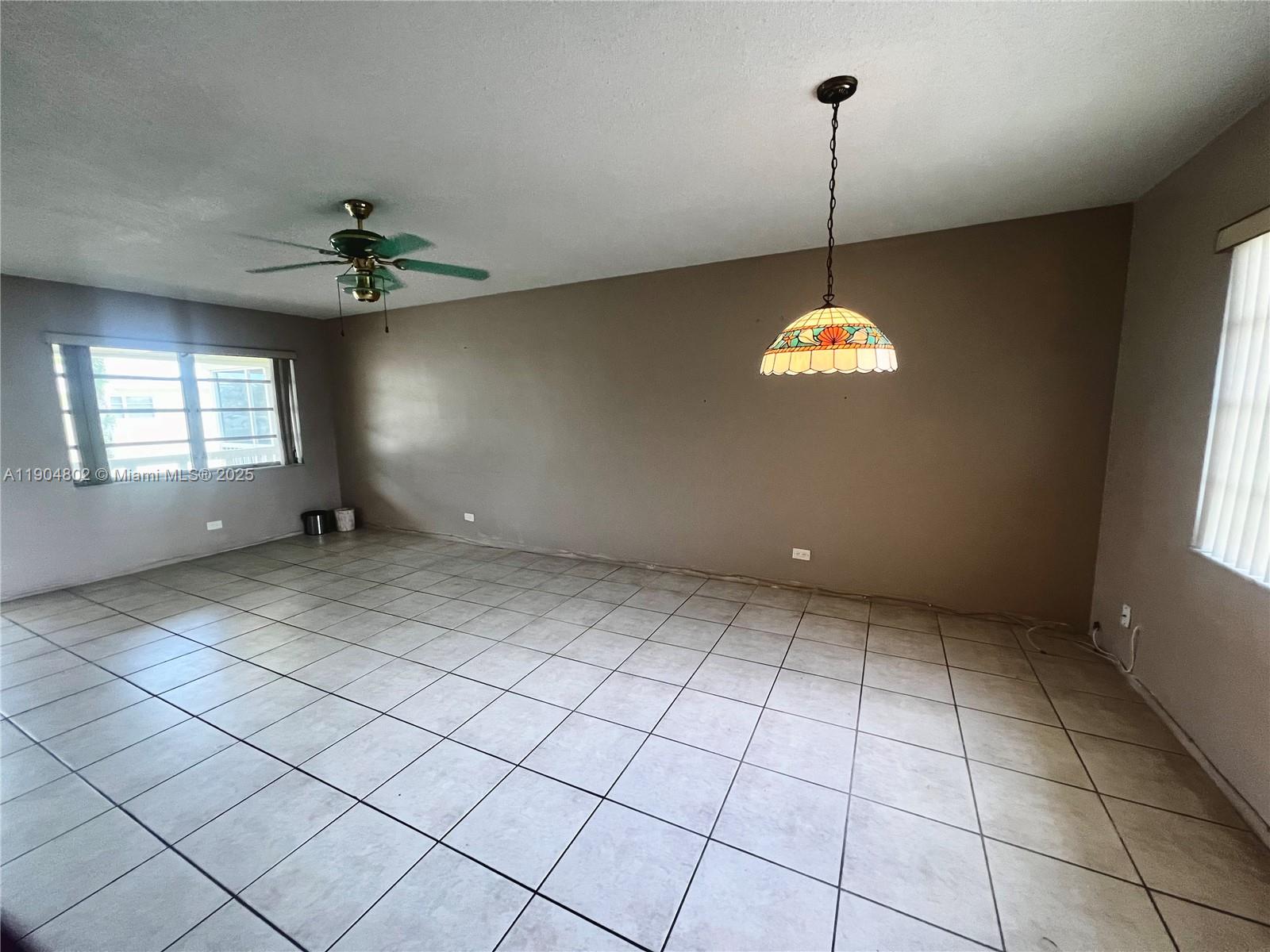 1501 Arthur Street, Unit 9 Hollywood, FL 33020 - Photo 4 of 20 a view of an empty room with a window
