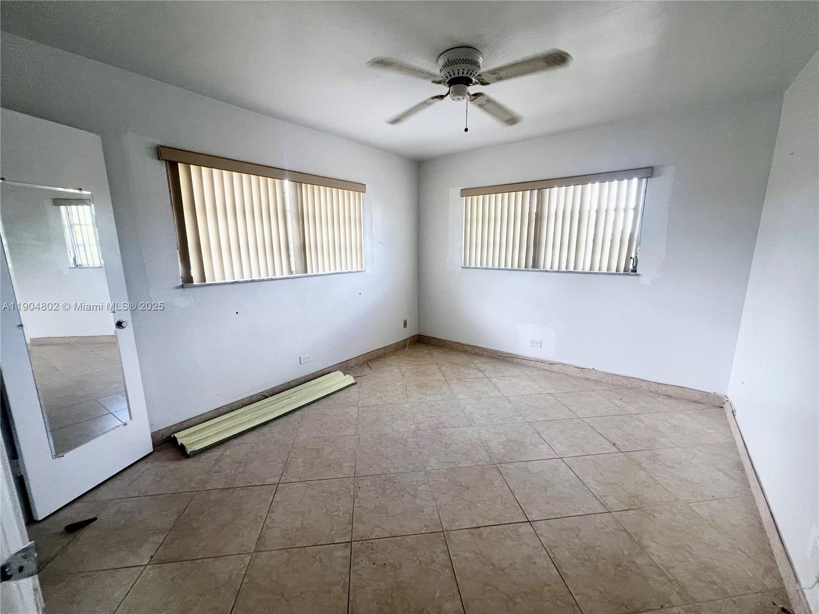 1501 Arthur Street, Unit 9 Hollywood, FL 33020 - Photo 8 of 20 a view of an empty room with a window