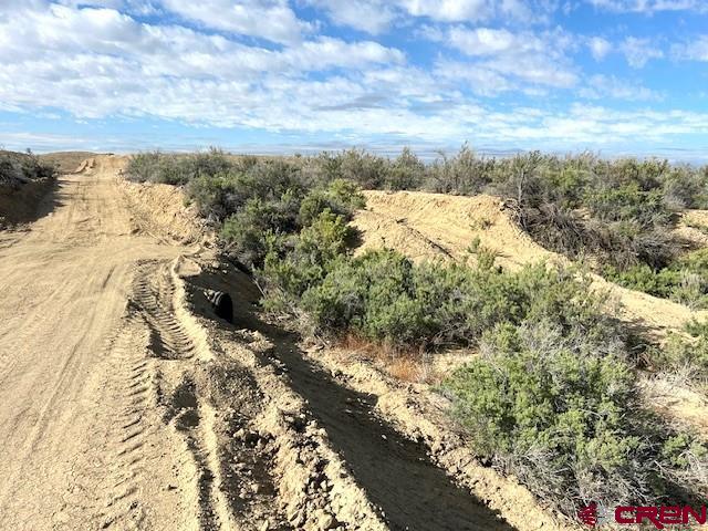 Lot 1 H75 Road Delta, CO 81416 - Photo 6 of 11 a view of a dry yard with wooden fence