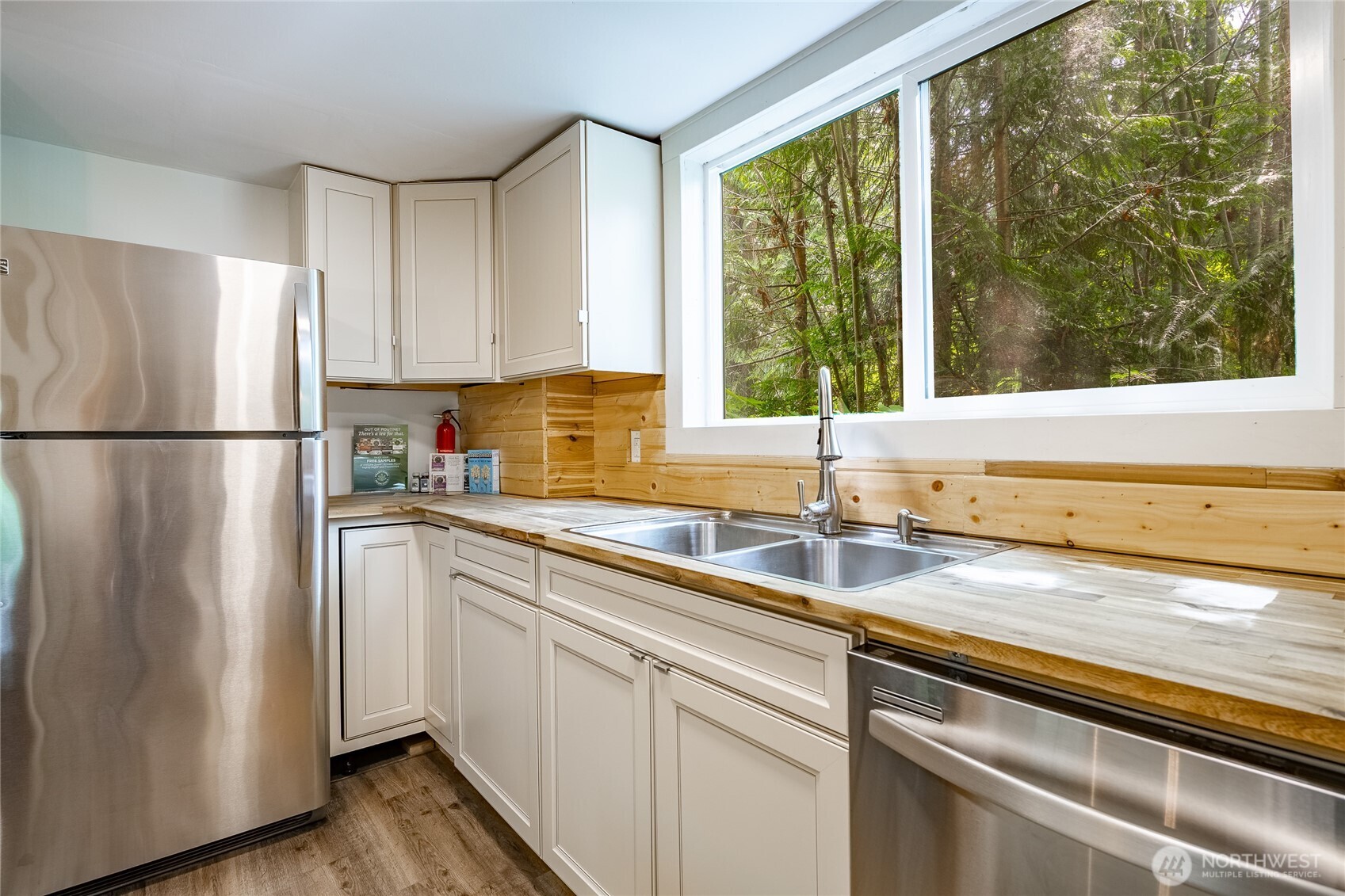 14001 Welcome Road Glacier, WA 98244 - Photo 12 of 39 a kitchen with a refrigerator and a sink