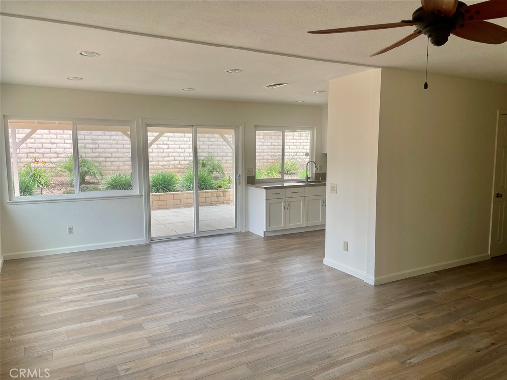 4317 Ardsley Court Riverside, CA 92505 - Photo 4 of 7 a view of a kitchen with wooden floor and a window
