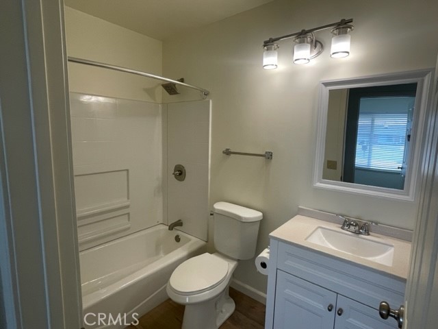 4317 Ardsley Court Riverside, CA 92505 - Photo 6 of 7 a bathroom with a sink toilet tub and shower