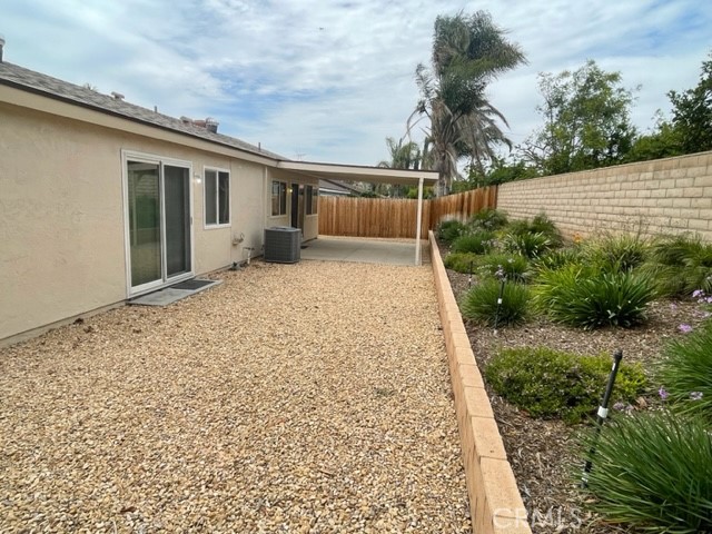 4317 Ardsley Court Riverside, CA 92505 - Photo 7 of 7 a backyard of a house with lots of green space