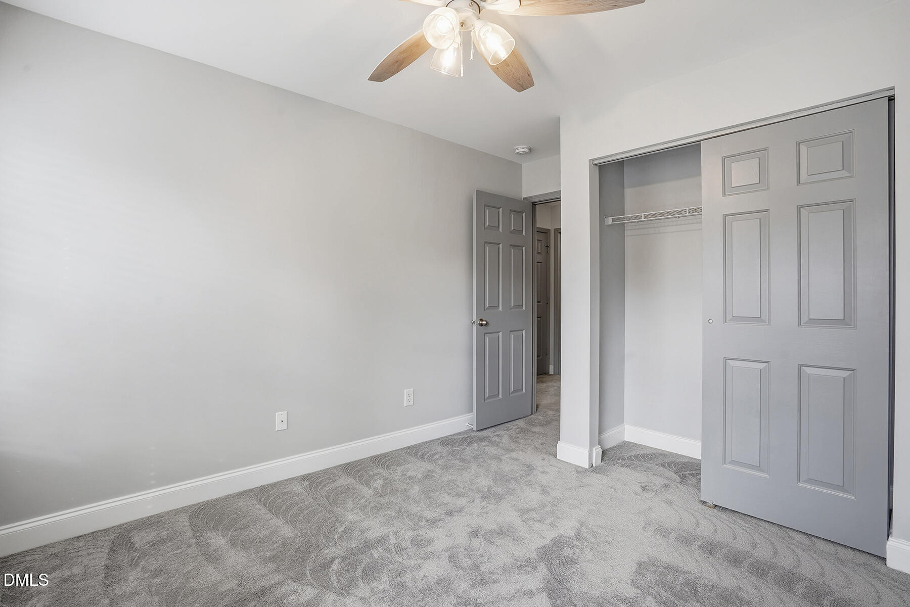 520 Camden Yards Way Cary, NC 27519 - Photo 20 of 30 an empty room with a empty space and a ceiling fan