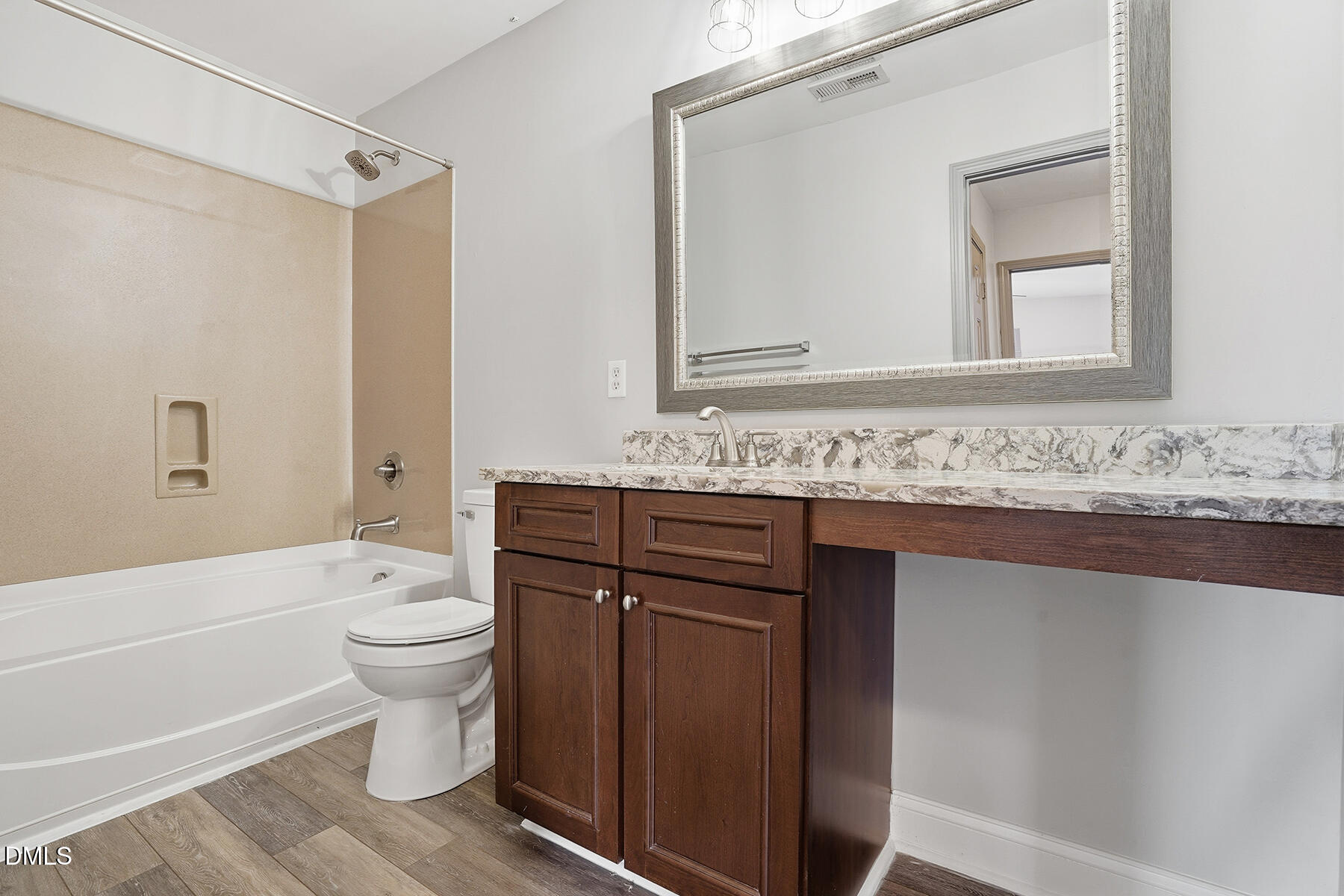 520 Camden Yards Way Cary, NC 27519 - Photo 23 of 30 a bathroom with a sink a toilet and shower