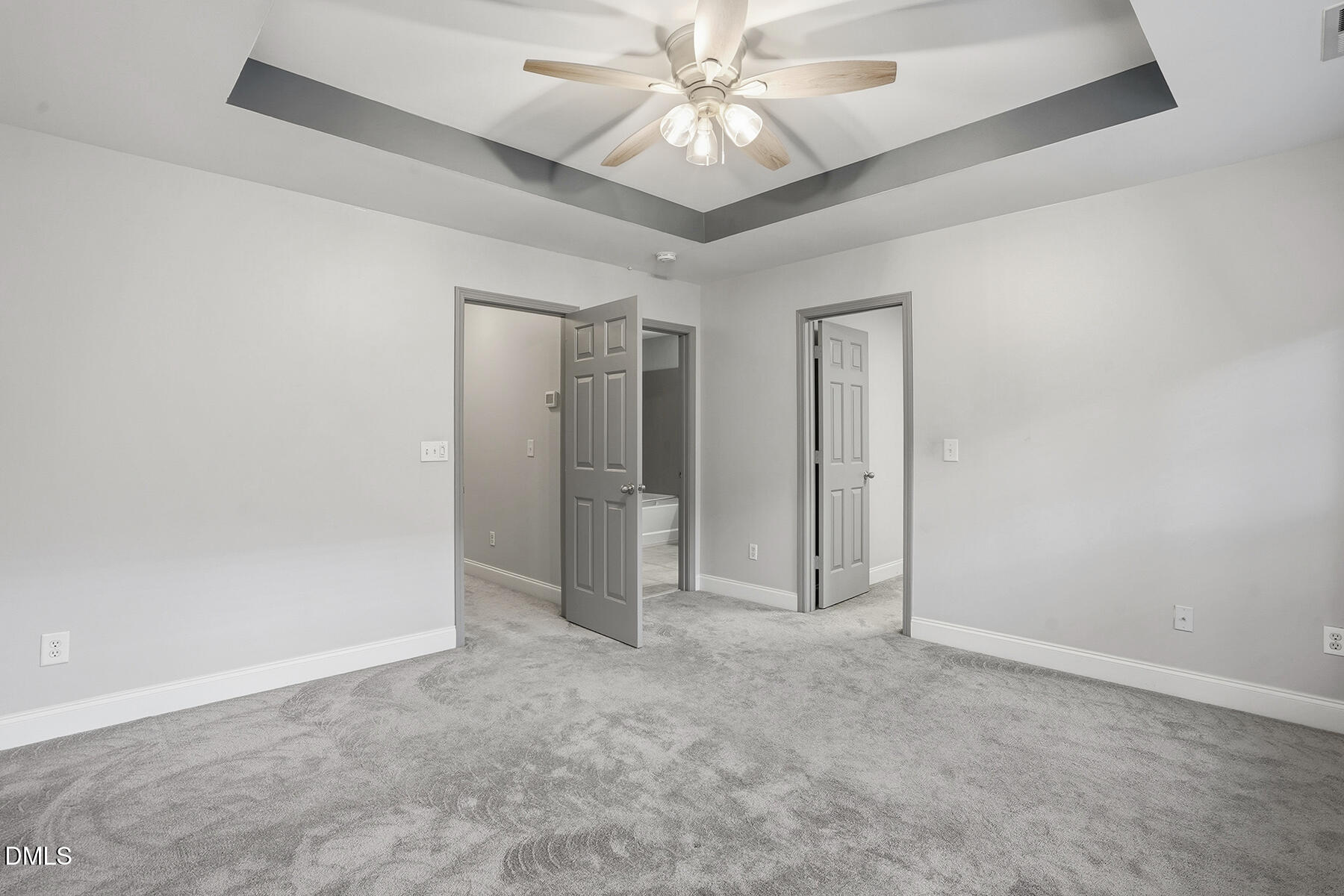 520 Camden Yards Way Cary, NC 27519 - Photo 26 of 30 an empty room with closet and a ceiling fan